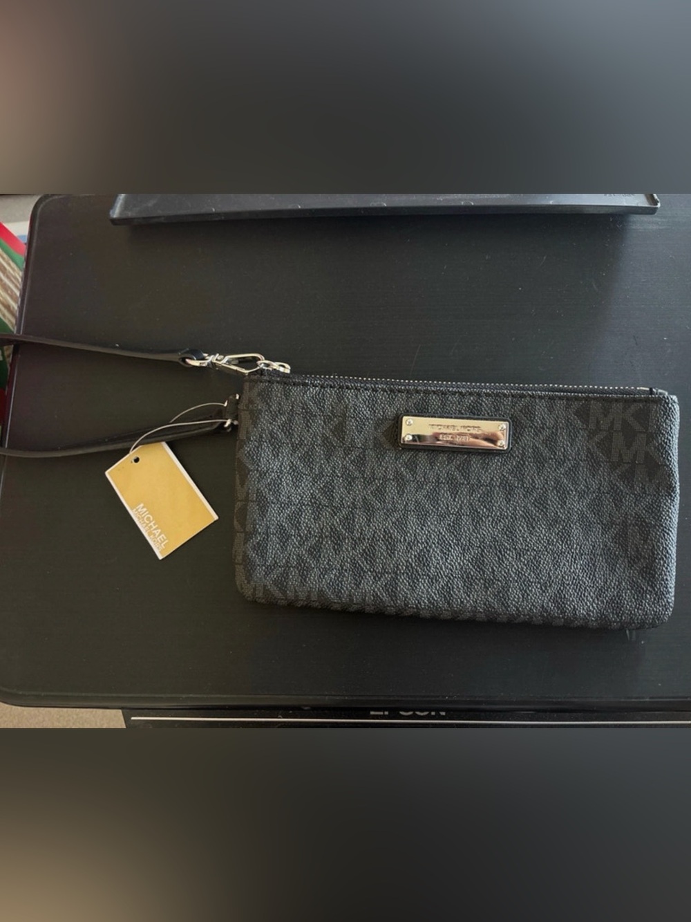 Michael Kors Dark Gray Signature Wristlet with Metal Plaque